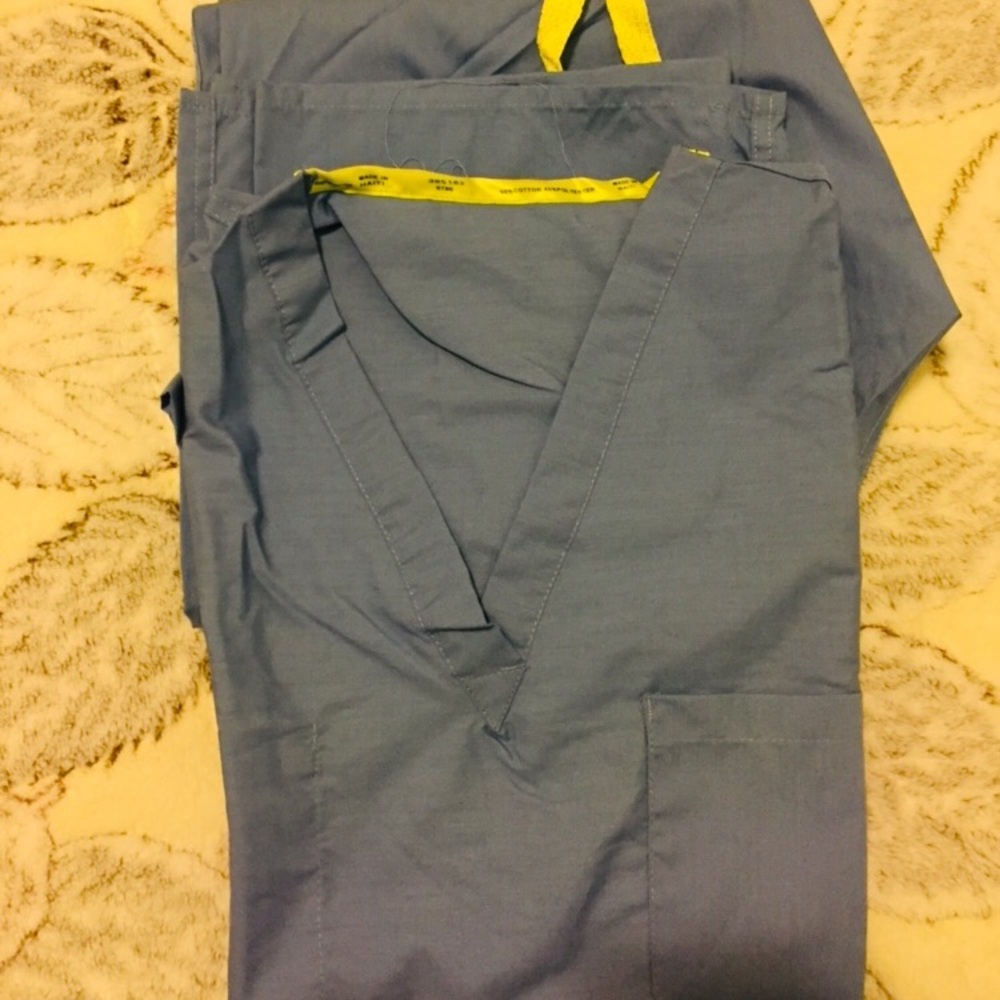 Brand new set of scrubs size small